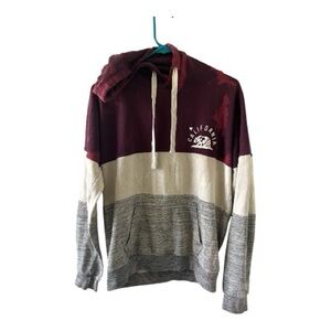 Reflex brand pullover hoodie in a woman’s size Medium.